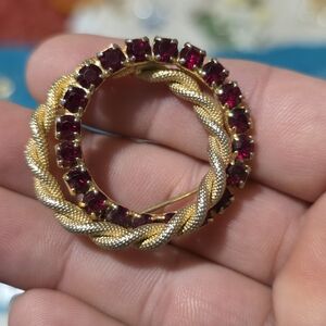 Elegant Gold and Red Gemstone Brooch